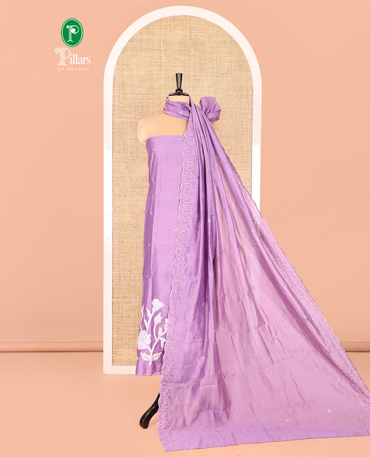 Lavender Mul Chanderi Material Chudidar Set, Elevated with Appliqué Floral Embroidery on Its Top, a Plain Santoon Bottom, and Paired Scallop Embroidered Mul Chanderi Dupatta