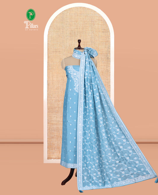 Sea Blue Viscose Muslin Material Churidar Features Buttas Thread Woven Top, a Santoon Bottom, and Floral Jaal Dupatta