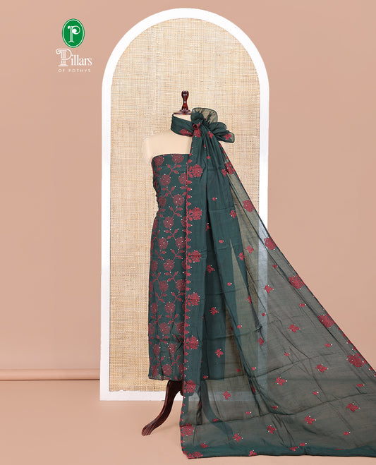 Bottel Green Mul Chanderi Material Churidar Features Floral Vine Embroidery Top, a Plain Bottom, and a Embroidered Dupatta