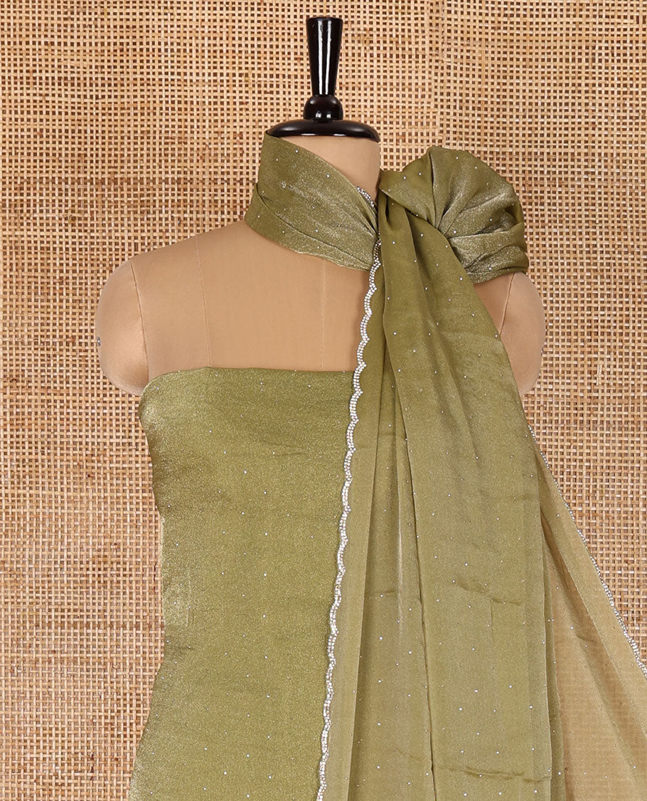 Green material chudidar set, stone work moss organza top, a matching bottom, and scallop stone work moss organza dupatta