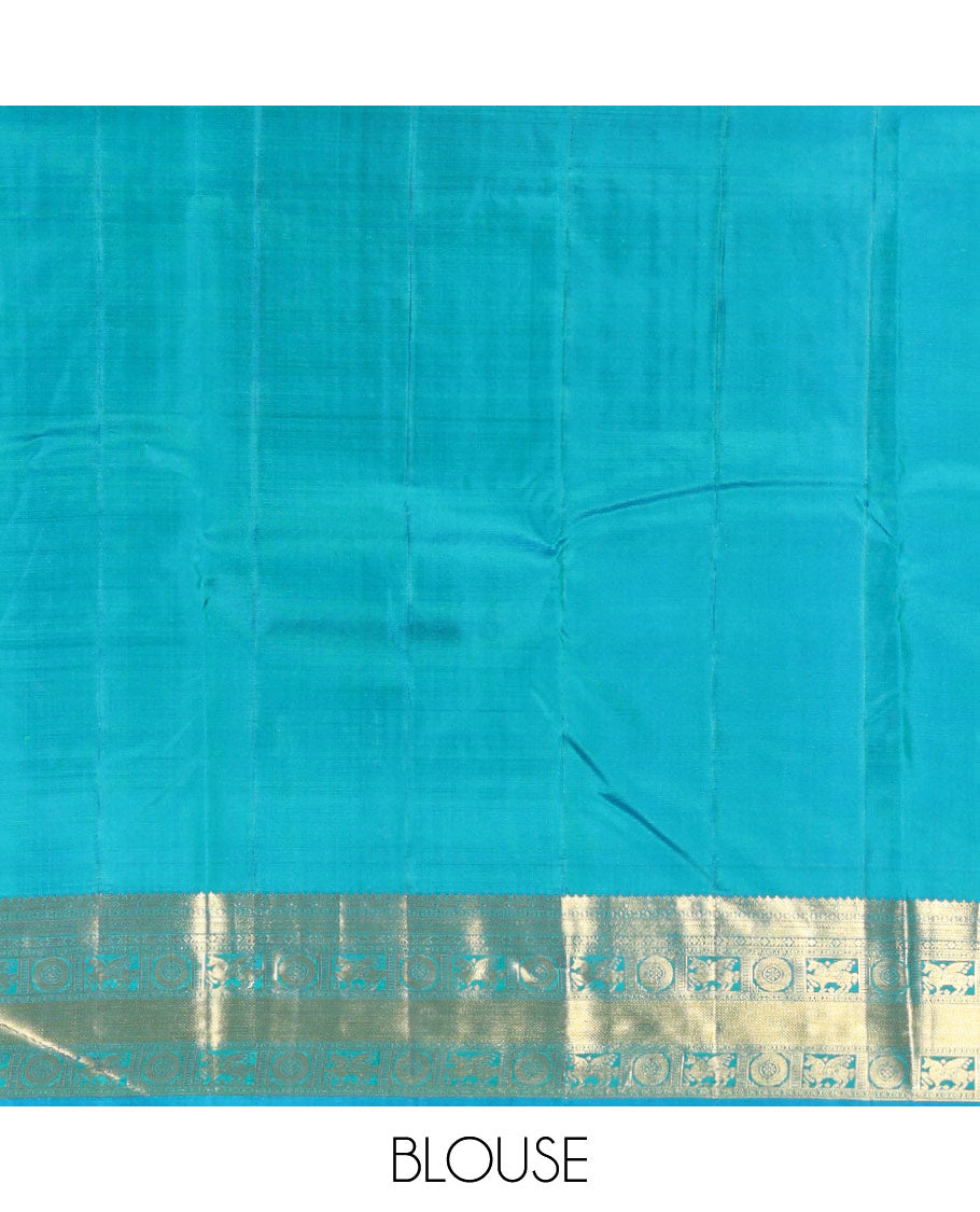 Peacock Blue Vasundhara Silk Saree Gleamed Up with Zari Buttas Enclosed in Zari Checks, Featuring a Zari Border of Kuthirai and Chakra Designs, Pallu Complemented by Rich Zari Weave, and a Matching Blouse