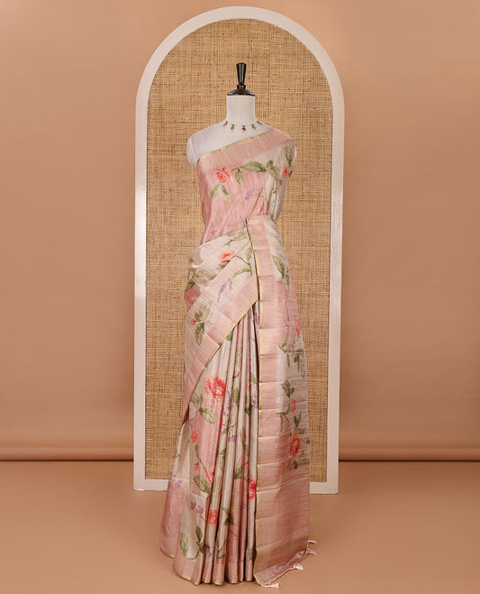 Light peach floral-leaf printed fancy tussar silk saree, zari woven border & zari striped pallu & matching stripes & floral printed blouse