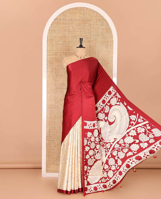 Chikku-maroon half-and-half plain and kalamkari floral printed satin crepe saree, plain border, pallu of floral vine and peacock printed, and kalamkari floral printed blouse