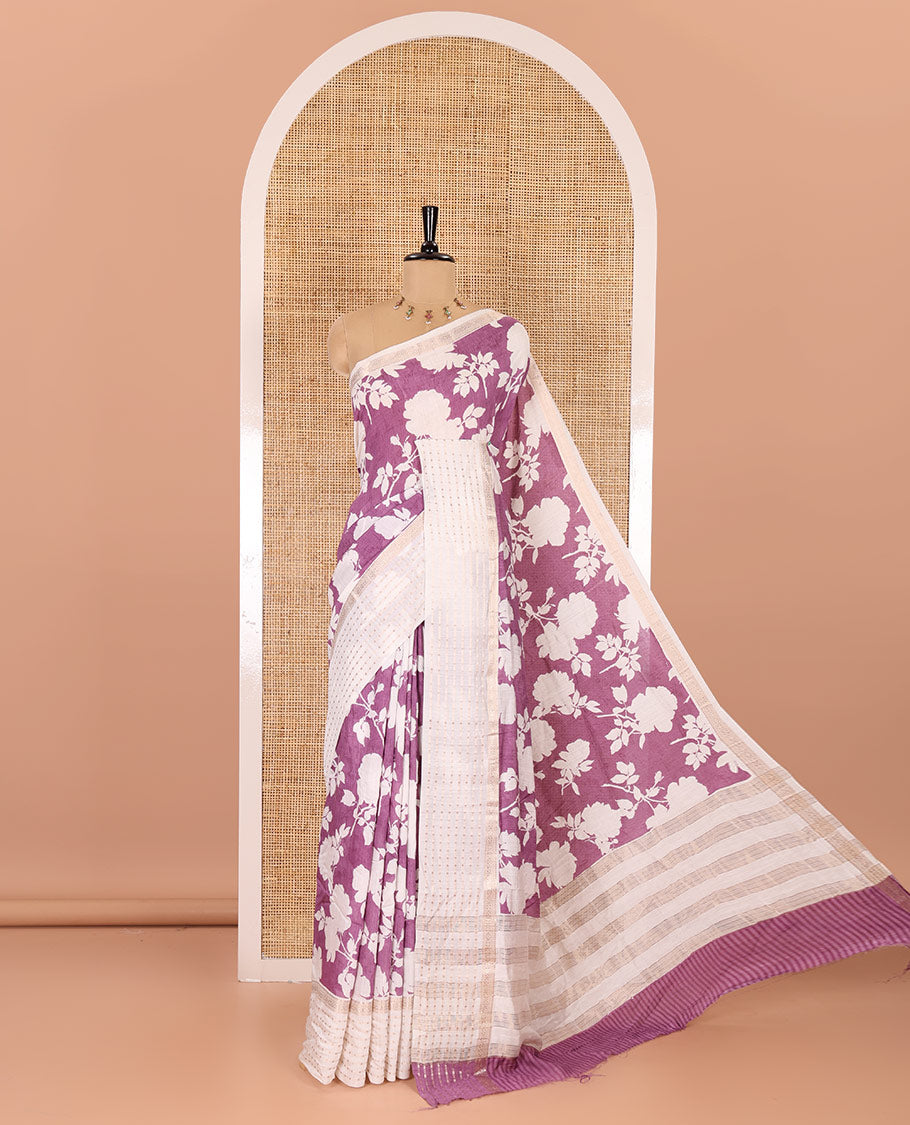Lavender silhouette-style floral discharge printed Assam silk saree, contrast traditional zari border of rudraksham motifs, zari striped pallu, and a floral printed blouse