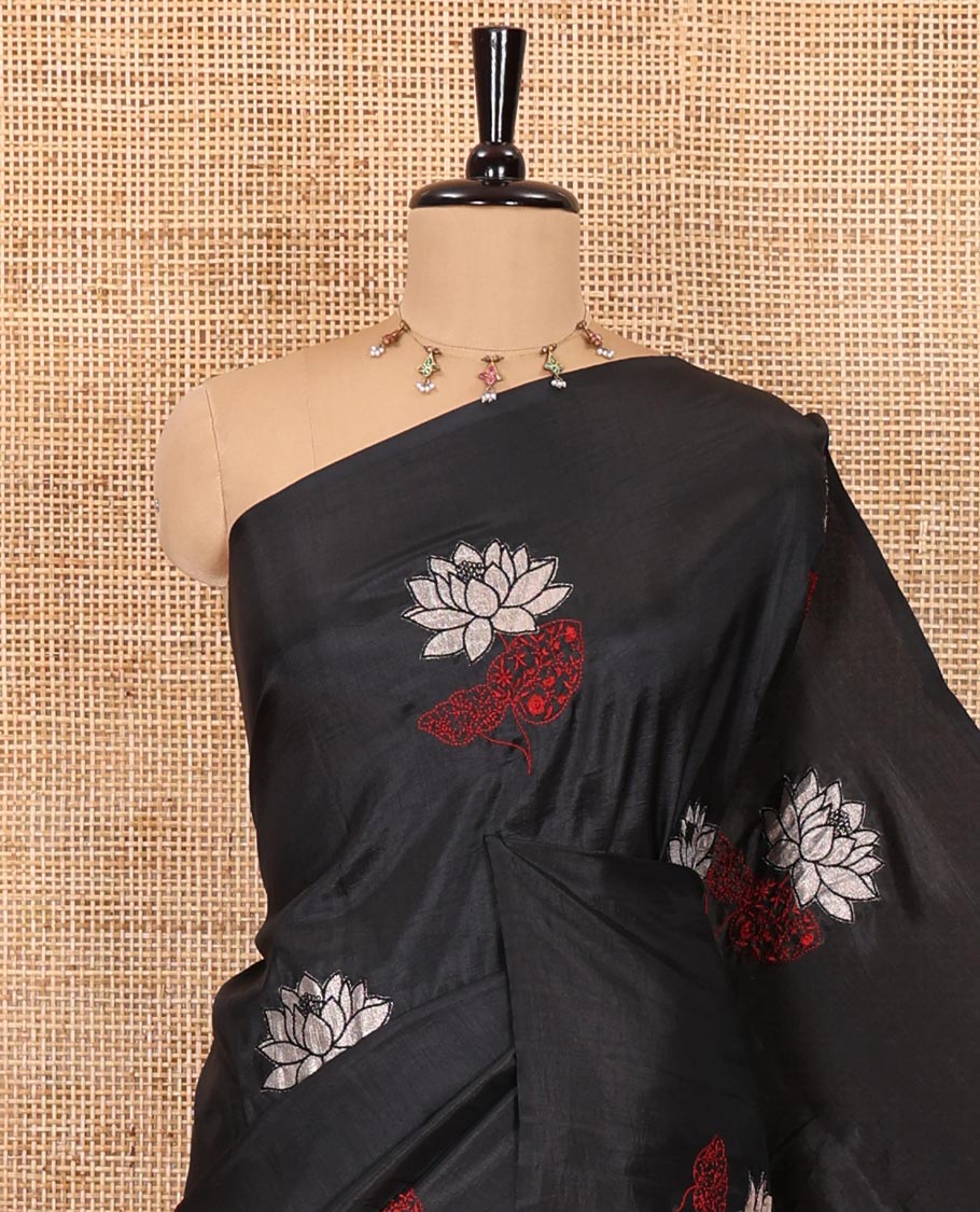 Borderless black floral motifs embroidered fancy tussar saree, floral motifs embroidered pallu, and a plain blouse