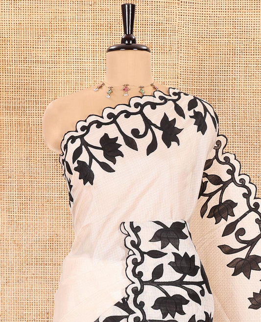 Cream and Black Plain Fancy Kota Silk Saree Sparsely Sparkled with Lotus Floral Applique Embroidered Scallop Border, Lotus Motifs Applique Embroidered Pallu, and a Contrast Plain Blouse