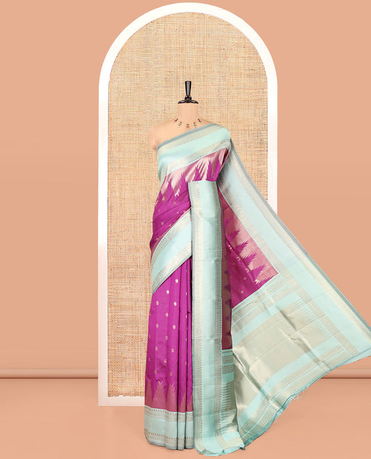 Magenta Litchi Saree, Bedecked with Peacock Buttas , Contrast Temple Traditional Rettai Pettu Border, Pallu of Traditional , and Contrast Blouse