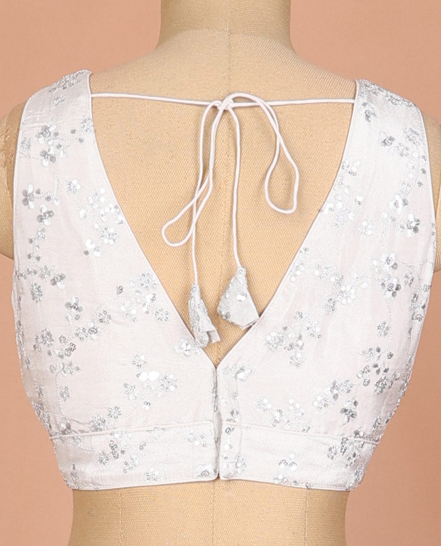 Off-white floral vine thread embroidered sleeveless readymade blouse with front and back deep-V neck
