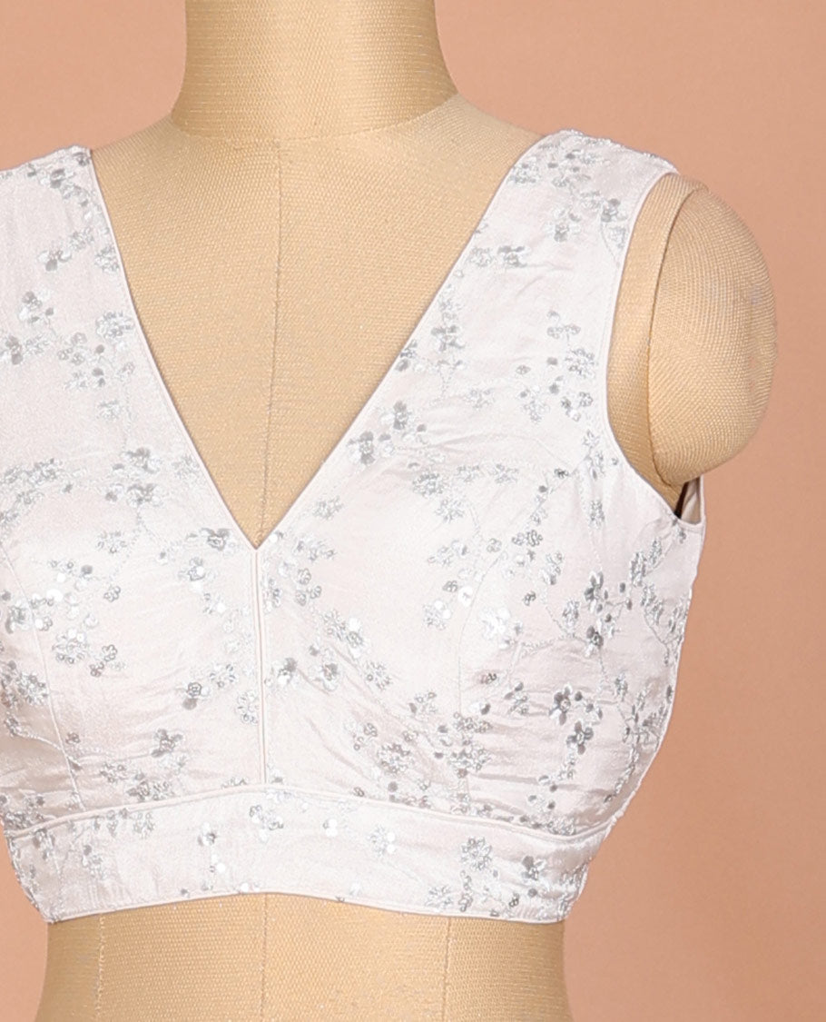 Off-white floral vine thread embroidered sleeveless readymade blouse with front and back deep-V neck
