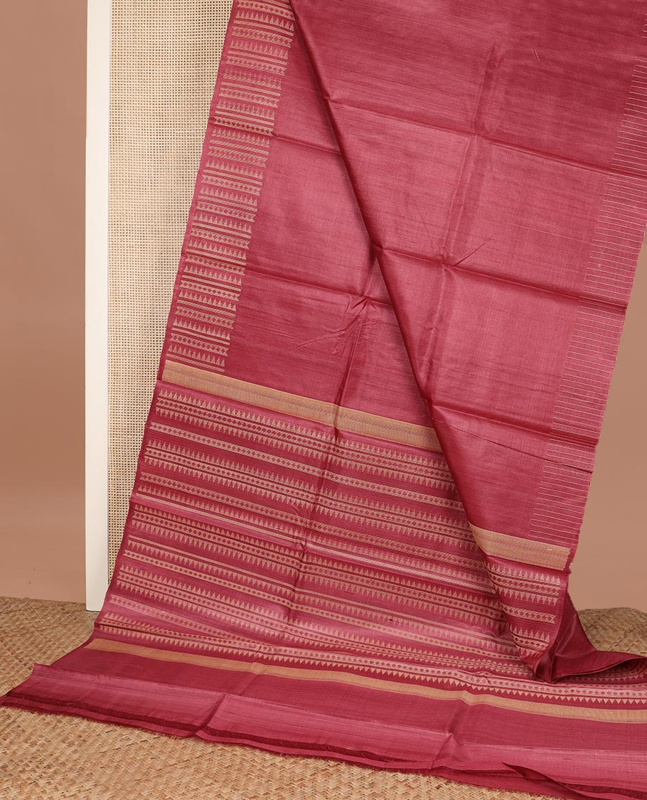 Red plain tussar silk saree, self border and pallu features geometric patterns, and temple motifs