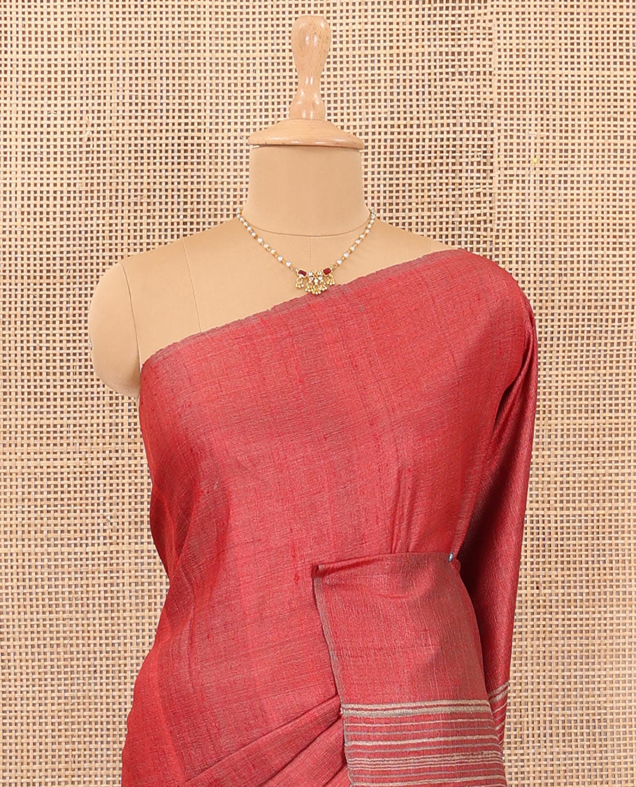Borderless red plain tussar silk saree, self-pallu of stripes