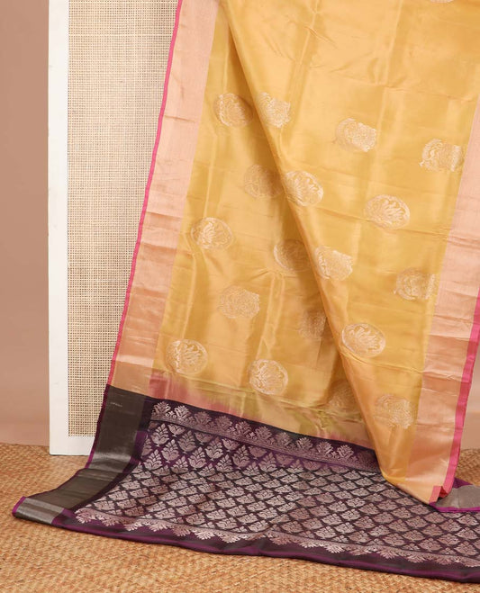 Yellow floral motifs uppada silk saree with contrast zari border & floral design pallu