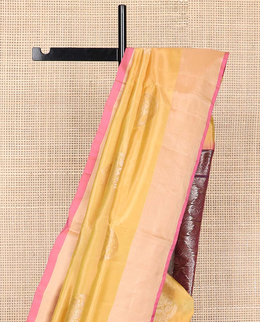 Yellow floral motifs uppada silk saree with contrast zari border & floral design pallu