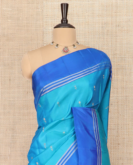 Blue Semi Uppada Saree Beautified with Zari Buttas, Complemented by a Contrasting Border, Pallu of Intricate Jaal Designs, and Paired with a Contrast Blouse