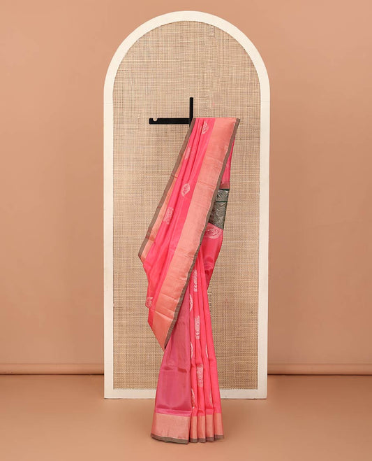 Pink zari buttas Uppada saree, bavanji border, and contrast intricate pallu