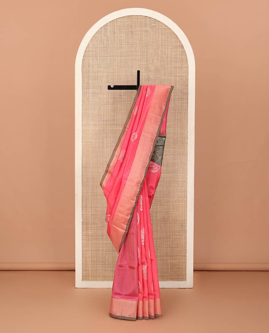 Pink zari buttas Uppada saree, bavanji border, and contrast intricate pallu