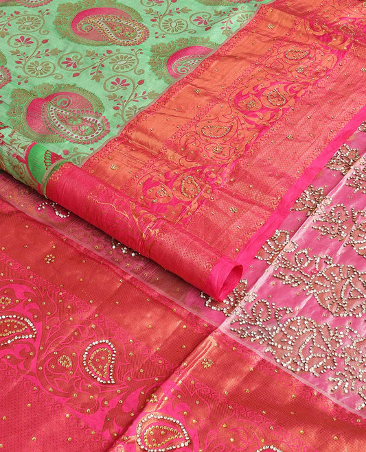 Mint green floral design vastrakala silk saree with stone work, contrast floral stone work scallop border & floral design in stone work pallu