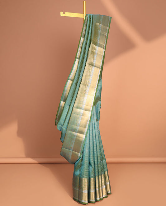 Green striped vasundhara elite silk saree with self intricate zari design border & striped pallu