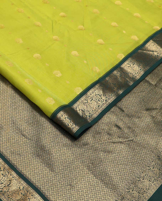 Green zari buttas Vasundhara silk mix saree, contrast border of muthu, poun, and mayil designs, and intricate pallu