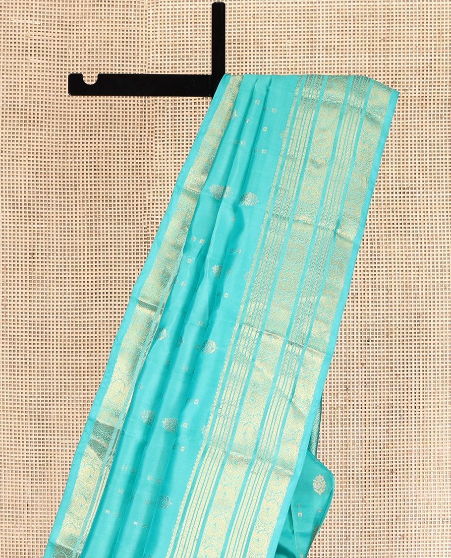 Turquoise Vasundhara Lite Silk Mix Saree, Decked Up with Zari Buttas, Highlighted by a Zari Border of Kathir, Muthu, and Mayil Designs, Intricate Pallu, and a Matching Blouse