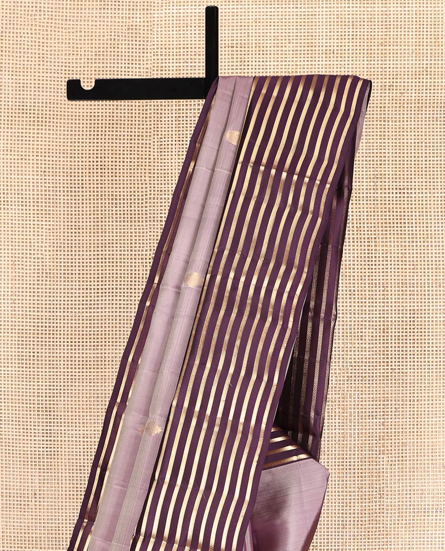 Light Purple Vasundhara Lite-Silk Mix Saree, Enthralled with Zari Buttas, Complemented by a Contrast Zari Striped Border, Grand Jaal Pallu, and a Contrast Blouse