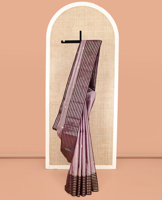 Light Purple Vasundhara Lite-Silk Mix Saree, Enthralled with Zari Buttas, Complemented by a Contrast Zari Striped Border, Grand Jaal Pallu, and a Contrast Blouse