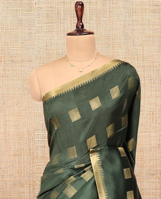 Green Banana Pith Saree, Sparsely Sparkled with Square Buttas All Over Its Body, Highlighted by a Zari Temple Border, Gleaming Zari Striped Pallu, and Paired with a Matching Blouse