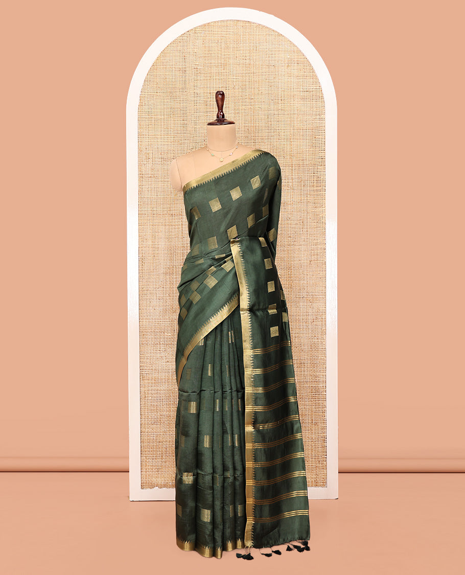 Green Banana Pith Saree, Sparsely Sparkled with Square Buttas All Over Its Body, Highlighted by a Zari Temple Border, Gleaming Zari Striped Pallu, and Paired with a Matching Blouse