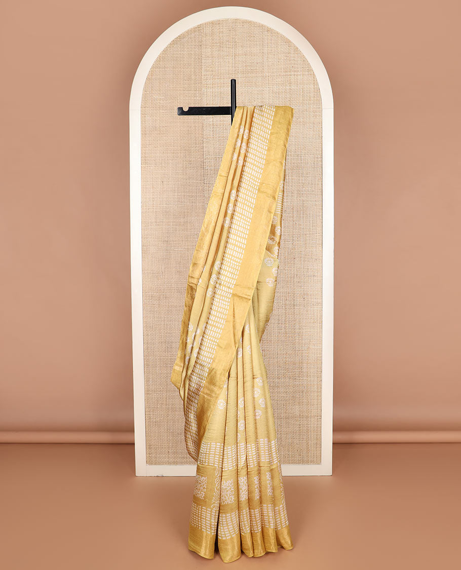 Yellow floral and geometric printed banana pith saree, zari border, and printed pallu