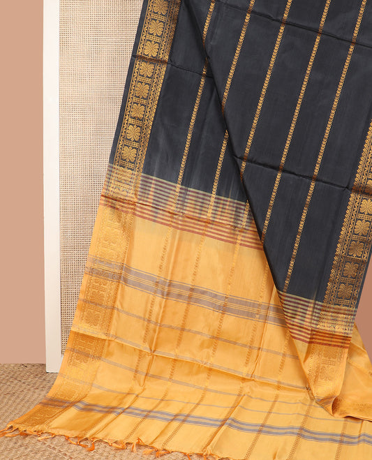 Black zari striped banana pith saree, traditional zari border, and contrast pallu of zari designs