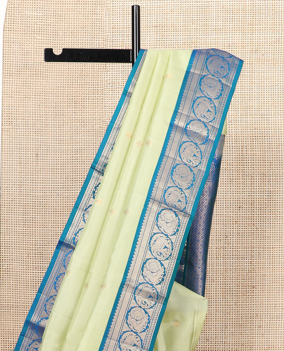 Green zari buttas silk saree, contrast border of banaras, mayil kann, round mayil, and round yaanai designs, and jaal pallu