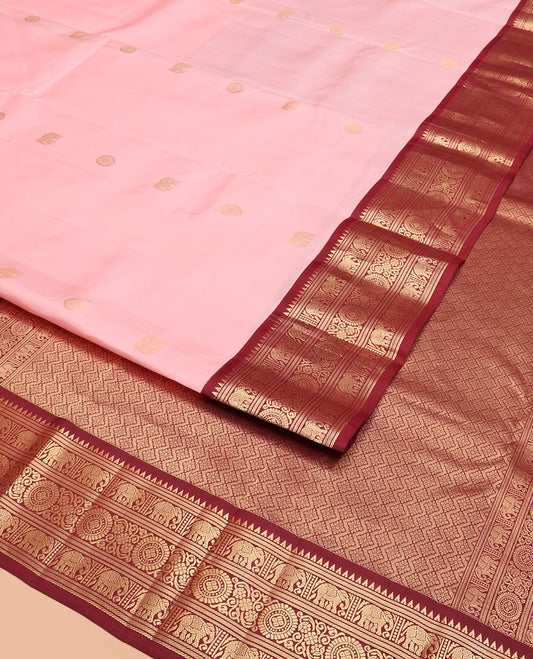 Pink Vasundhara Silk Saree Enriched with Yaanai and Chakram Buttas, Complemented by a Contrast Border of Thazampoo Rekku, Banaras, Mayil, and Yaanai Designs, Grandly Woven Pallu of Jaal Designs, and a Contrast Blouse
