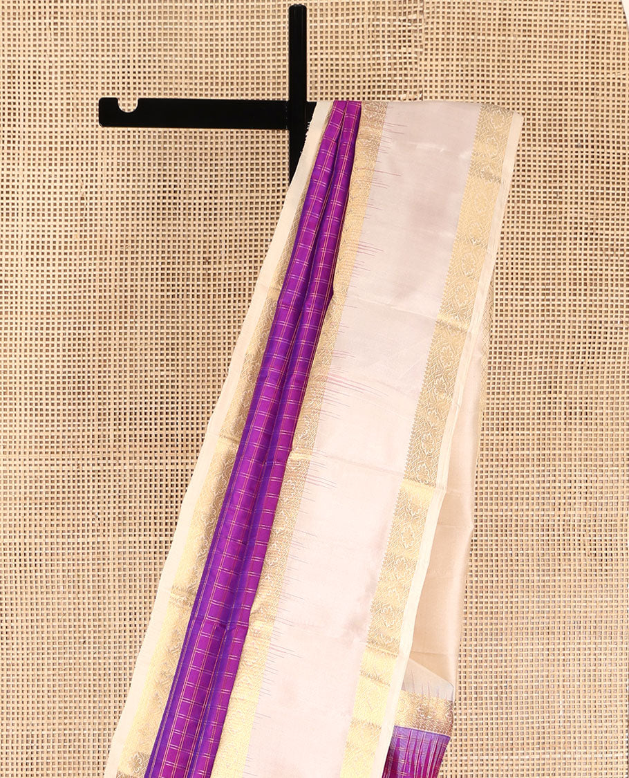 Purple Vasundhara Silk Saree, Steeped in Richness of Micro-Zari Checks All Over Its Body, Complemented by Contrast Rettai Pettu Border of Thilakam Mokku, Diamond, and Cross Kamalam Designs, Grand Jaal Pallu, and Paired with a Contrast Blouse