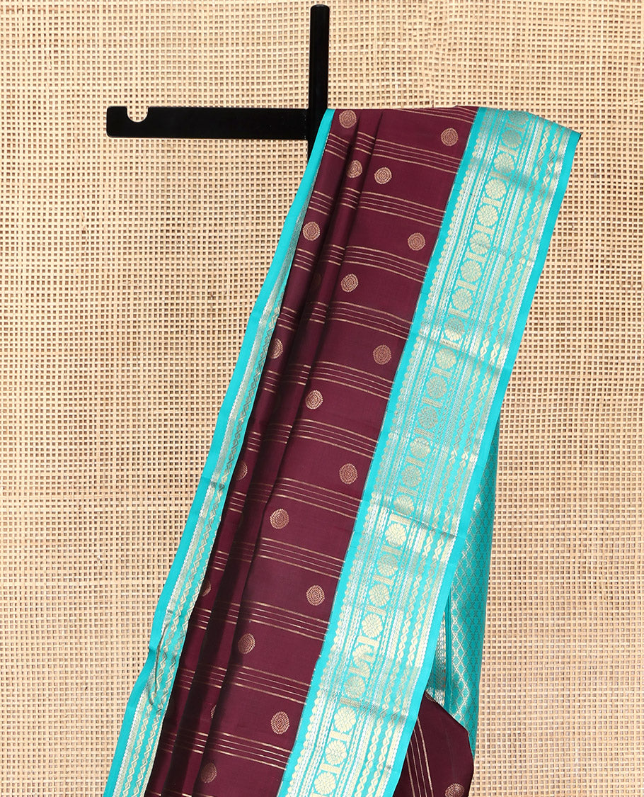 Maroon Vasundhara Silk Saree, Adorned with Stripes and Chakram Buttas, Complemented by a Contrast Border of Salngai, Neli, Kathir, and Chakram Design, Intricate Pallu, and a Contrast Blouse