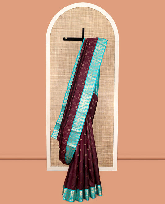 Maroon Vasundhara Silk Saree, Adorned with Stripes and Chakram Buttas, Complemented by a Contrast Border of Salngai, Neli, Kathir, and Chakram Design, Intricate Pallu, and a Contrast Blouse