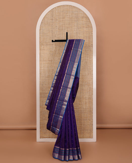 Ink blue zari buttas silk saree, contrast resham thread & zari border of banaras,muthu & mayil kann & diagonal striped pallu