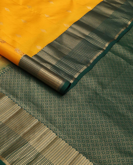 Yellow zari buttas silk saree, contrast zari border of vanki,muthu & banaras & pallu of paiyaadi kattam design