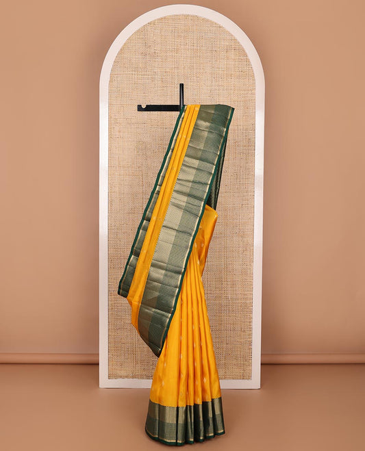 Yellow zari buttas silk saree, contrast zari border of vanki,muthu & banaras & pallu of paiyaadi kattam design