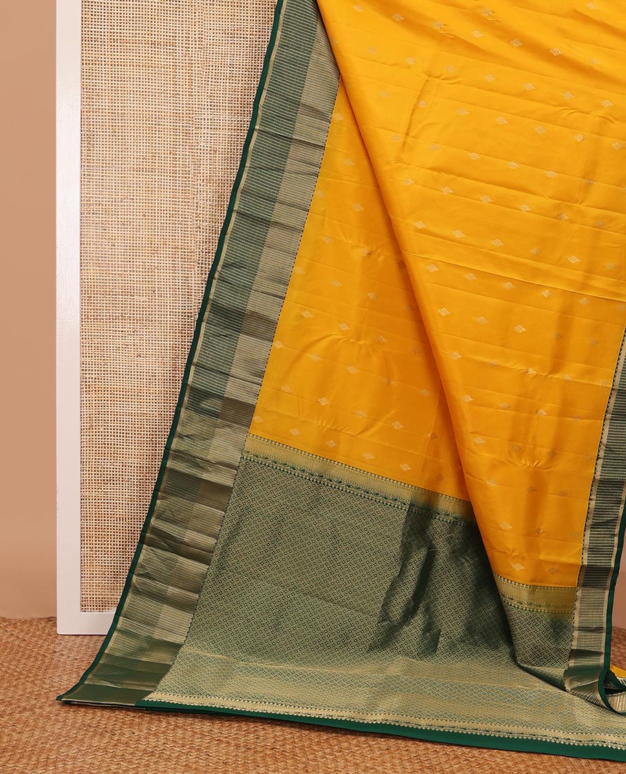 Yellow zari buttas silk saree, contrast zari border of vanki,muthu & banaras & pallu of paiyaadi kattam design