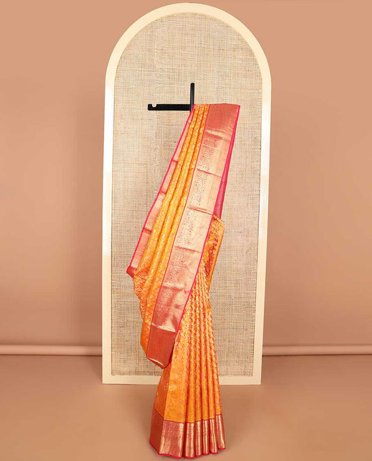 Orange floral jacqaurd kancheepuram silk saree with contrast intricate zari design border & checked floral design pallu