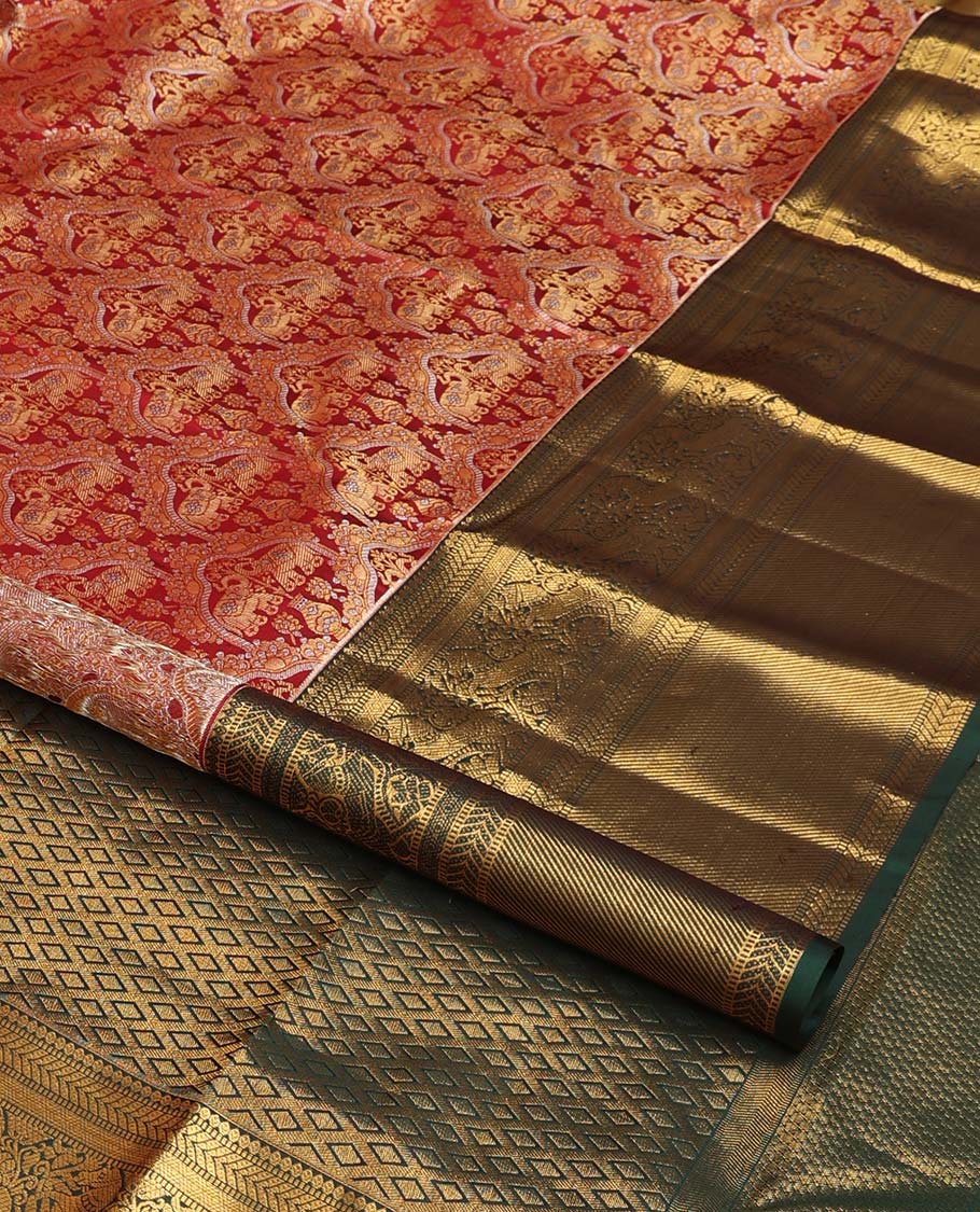 Cherry red yaanai jacquard wedding silk saree, contrast thilakam, muthu, kathir, diamond, kuthirai, and zari stripes, and jaal pallu
