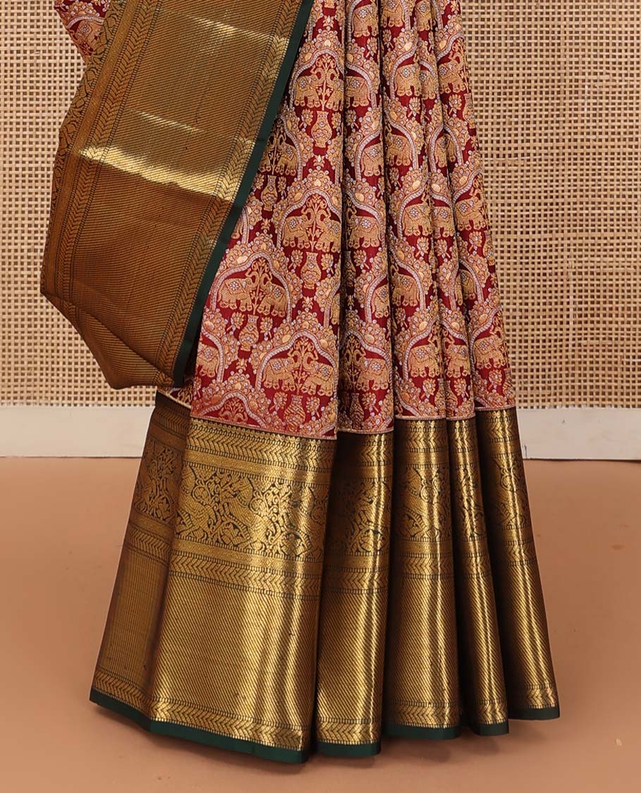 Cherry red yaanai jacquard wedding silk saree, contrast thilakam, muthu, kathir, diamond, kuthirai, and zari stripes, and jaal pallu