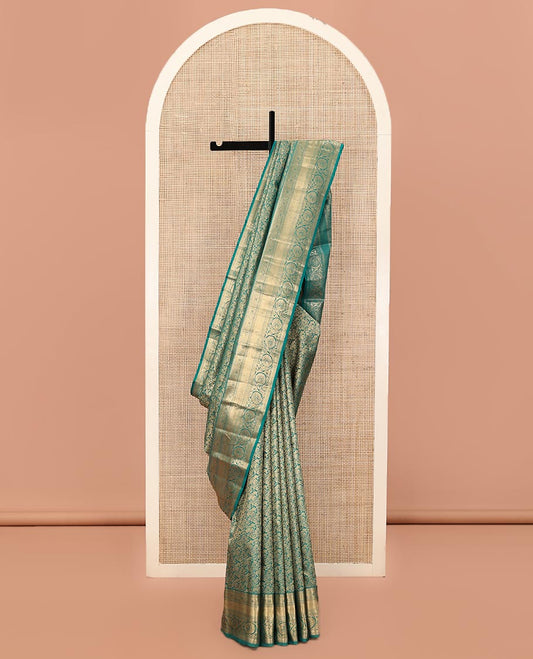 Rama Blue Kanchipuram Wedding Silk Saree, Steeped in Richness with Yaanai Jacquard on Its Body, Highlighted by a Zari Border of Rekku, Vanki, Diamond, and Kodi Visiry Designs, Grand Jaal Pallu, and Paired with a Matching Blouse