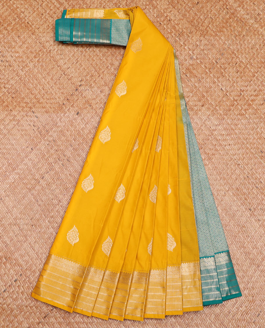 Yellow Budget Silk Saree Artfully Detailed with Zari Peacock Buttas, Featuring a Traditional Zari-Design Steeped Border, Captivating Contrast Jaal Pallu, and a Contrast Blouse