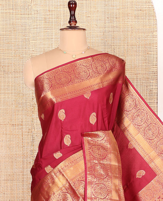 Red Budget Silk Saree Beautified with Paisley Buttas All Over Its Body, Highlighted by a Traditional Zari Design Border, Grand Pallu of Jaal Designs, and Paired with a Matching Blouse