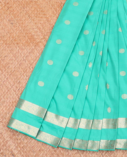 Turquoise Budget Silk Saree, Bedecked with Zari Buttas All Over Its Body, Highlighted by a Traditional Zari Design Rettai Pettu Border, Grand Jaal Pallu, and Paired with a Matching Blouse