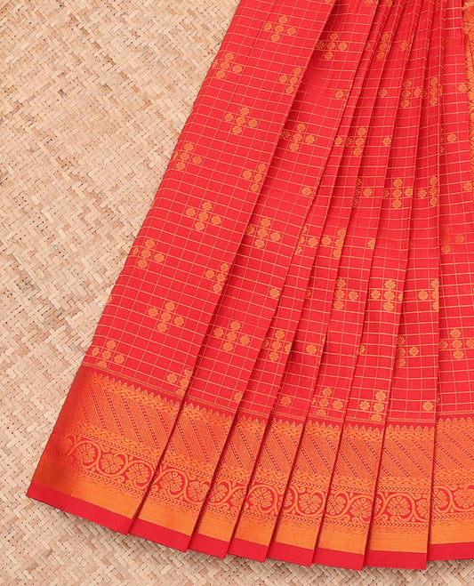 Red Budget Silk Saree, Boldly Accentuated with Zari Buttas and Checks All Over Its Body, Highlighted by a Traditional Zari Design Border, Grand Pallu, and Paired with a Matching Blouse