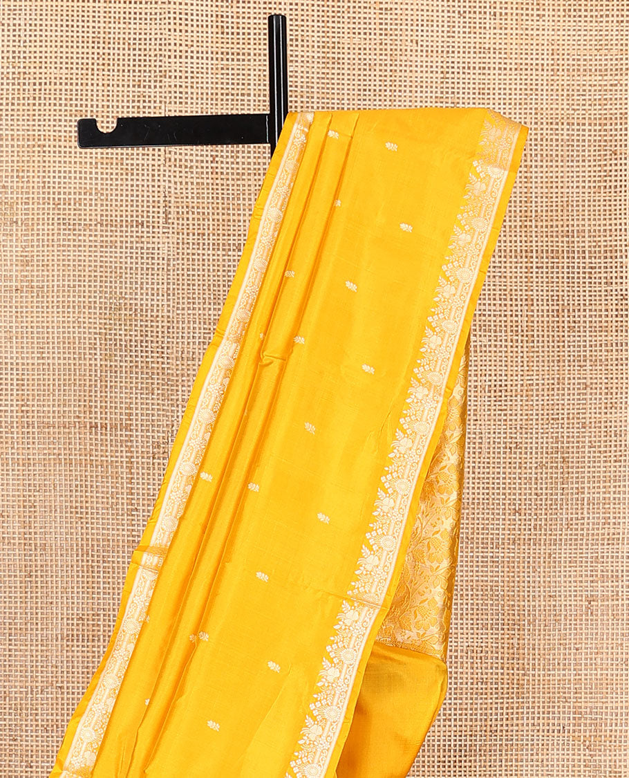 Yellow buttas woven banarasi kathan silk saree, zari border, and floral jaal pallu