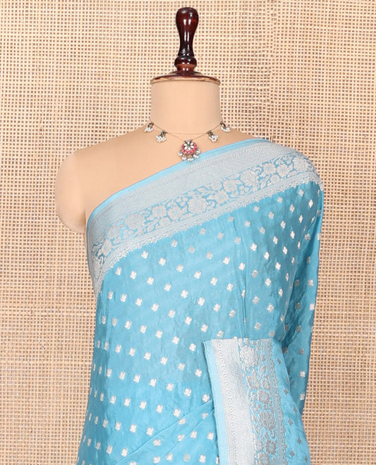 Blue Fancy Crepe Saree, Finely Woven with Buttas, Highlighted by a Floral Creeper Border, Floral Designs Woven Pallu, and a Matching Blouse