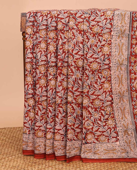 Maroon floral vine machine-printed Kalamkari cotton saree, printed border, and pallu of floral-print